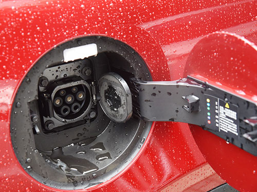 can you charge an electric vehicle in the rain